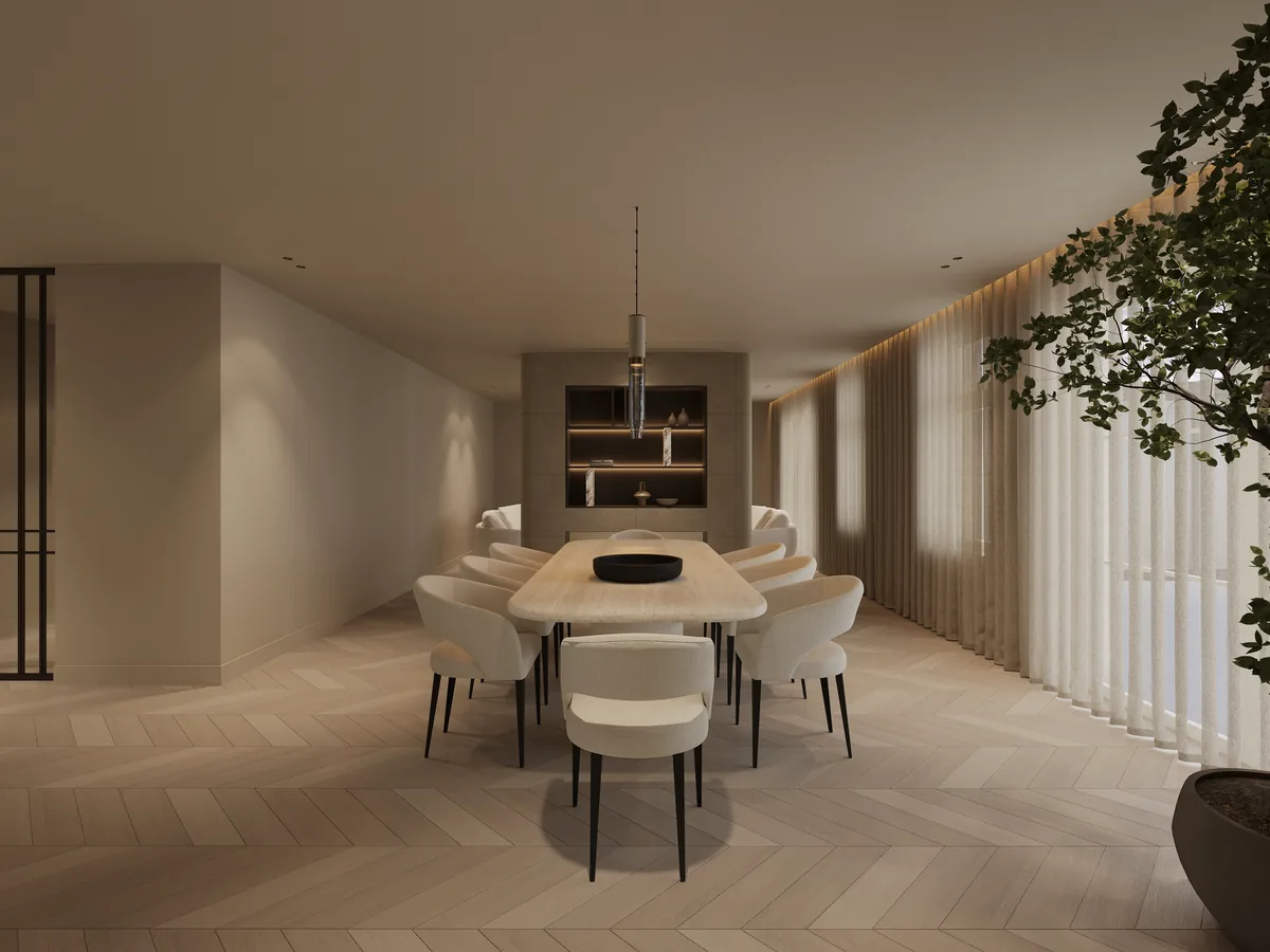 Eetkamer met ovale tafel en ingebouwde kastenwand