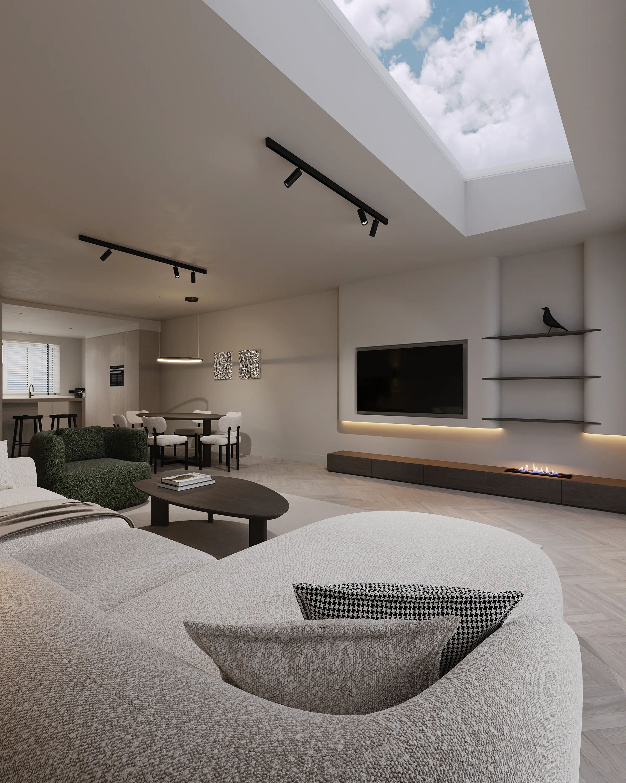 Woonkamer onder het daklicht, met de groene fauteuil en de lange zwevende wandkast