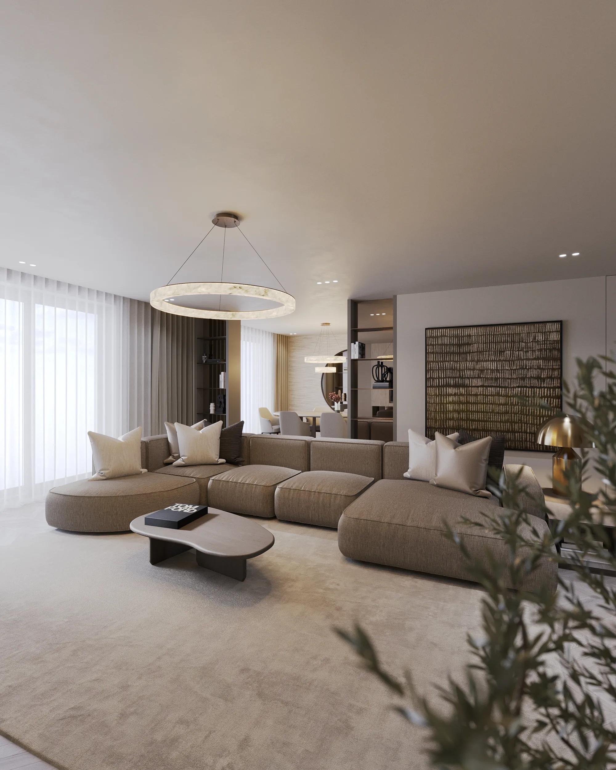 Woonkamer met modulaire bank en albasten ringarmatuur